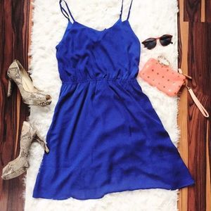 Brilliant blue empire bow back dress Size M short